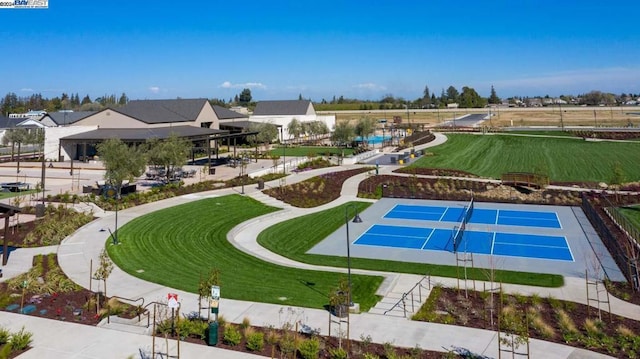 view of pool featuring tennis court