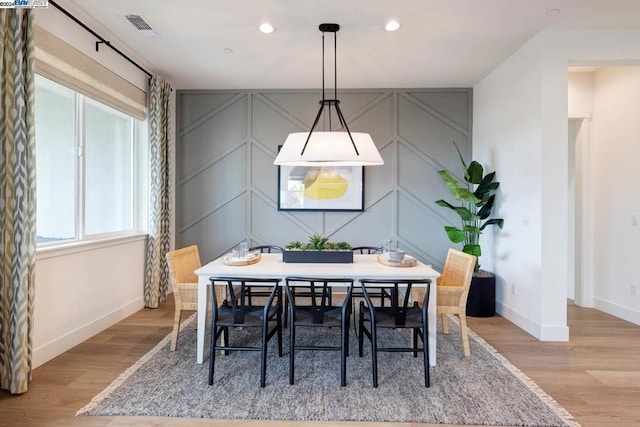 dining room with light wood-type flooring