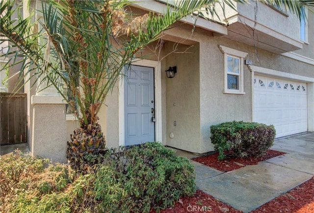 property entrance featuring a garage