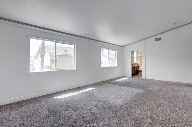 view of carpeted spare room