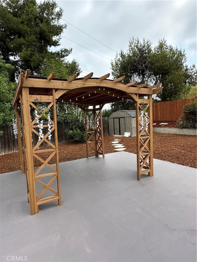 view of patio / terrace featuring a shed