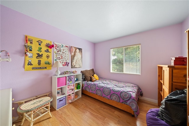 bedroom featuring light wood-type flooring