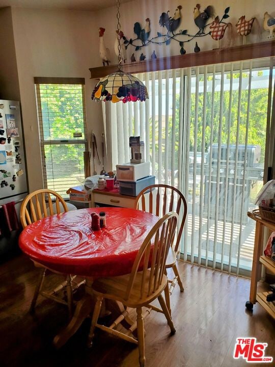 dining area featuring hardwood / wood-style flooring