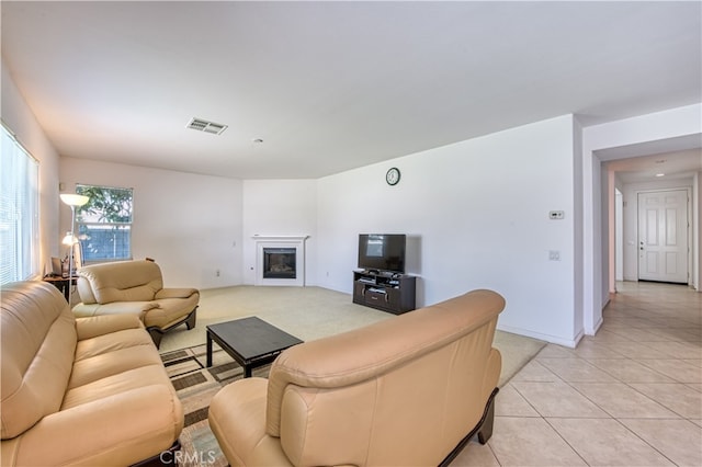 living room with light tile patterned flooring