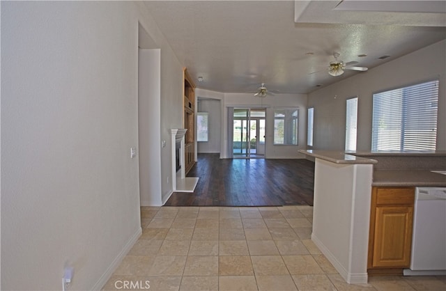 interior space featuring light hardwood / wood-style flooring and a textured ceiling