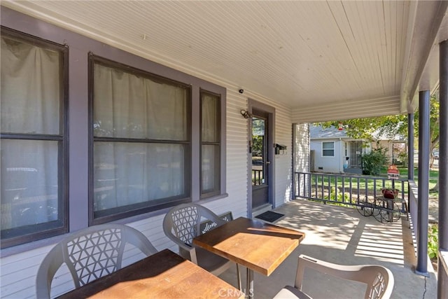 view of patio featuring a porch