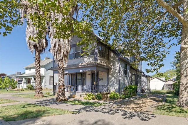 view of front of home featuring covered porch