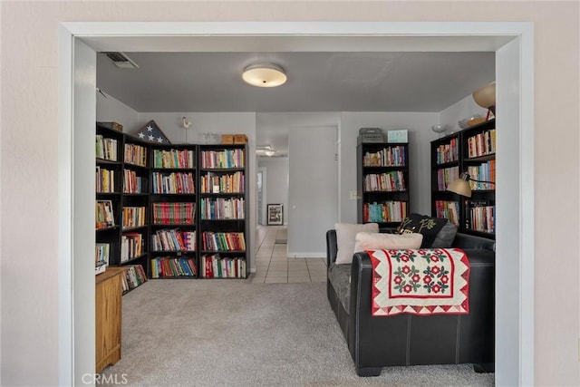 sitting room featuring carpet