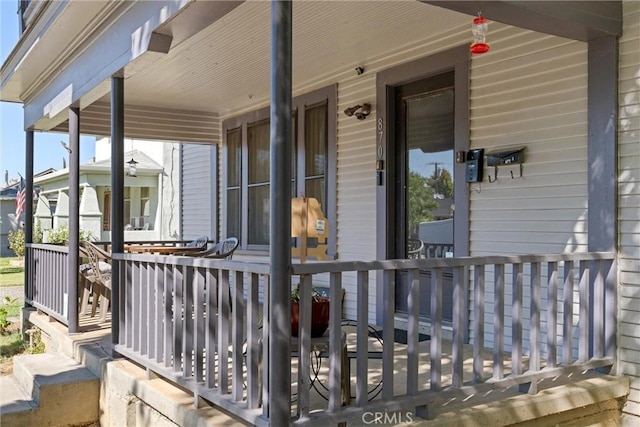 view of patio featuring a porch