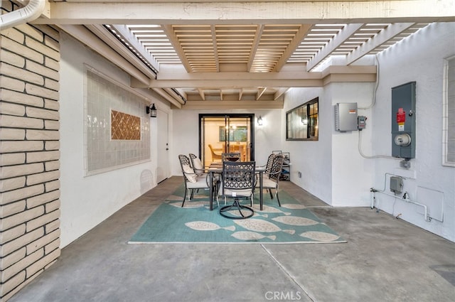 dining room featuring concrete flooring