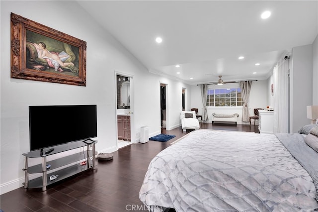 bedroom with connected bathroom, ornamental molding, dark hardwood / wood-style floors, and vaulted ceiling