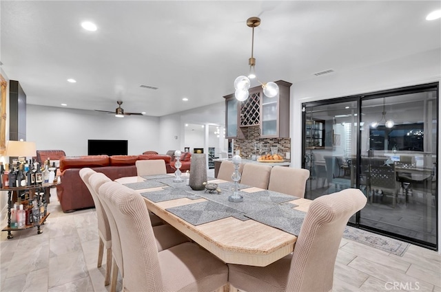 dining area featuring ceiling fan