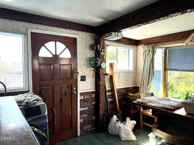 tiled entrance foyer with washer / dryer