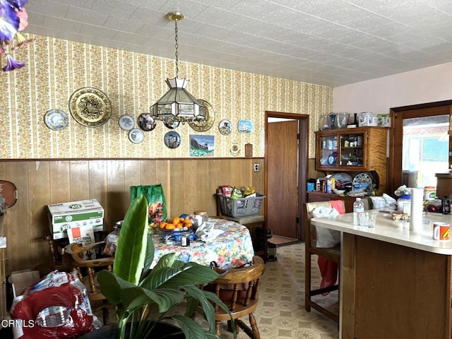 office area with wood walls