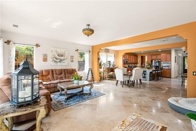 living room featuring plenty of natural light