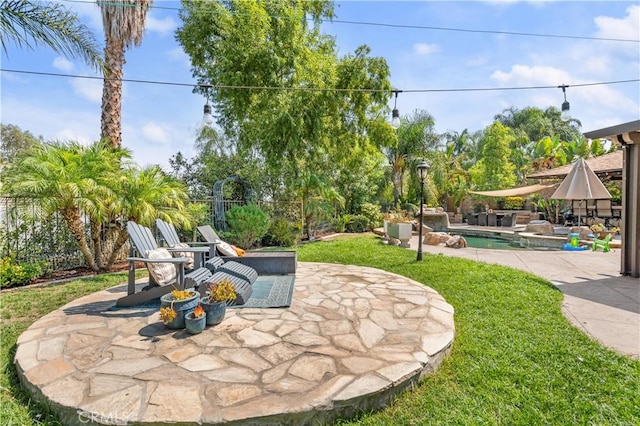 view of patio / terrace with a fenced in pool