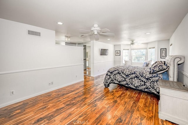 bedroom featuring ceiling fan and hardwood / wood-style floors