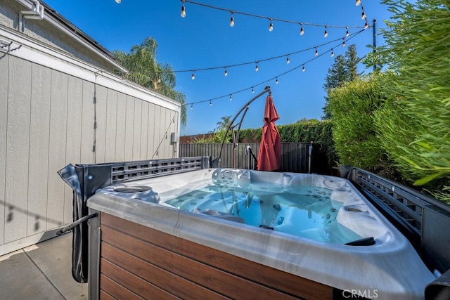 view of patio / terrace featuring a hot tub