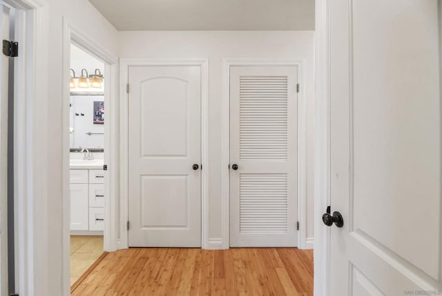 hallway featuring light wood-type flooring