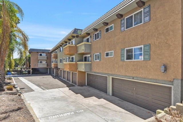 view of building exterior with a garage