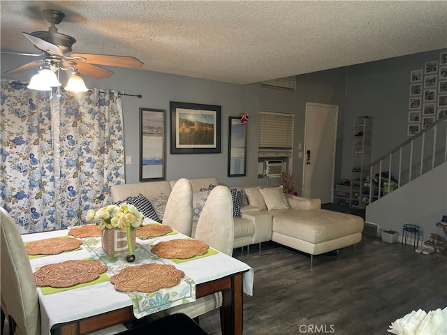 dining room featuring a textured ceiling, cooling unit, ceiling fan, and dark wood-type flooring