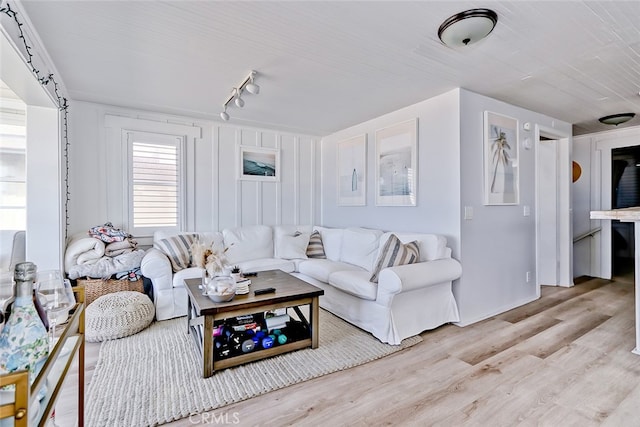 living room with light hardwood / wood-style floors