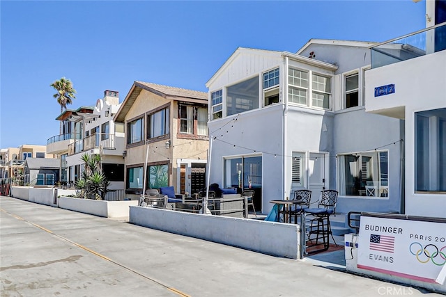 exterior space with a balcony