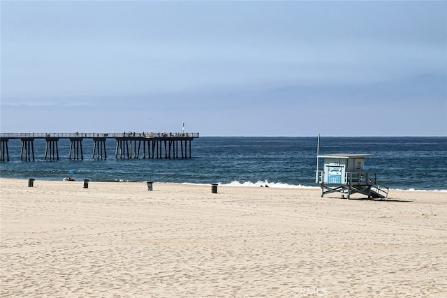 view of water feature with a beach view