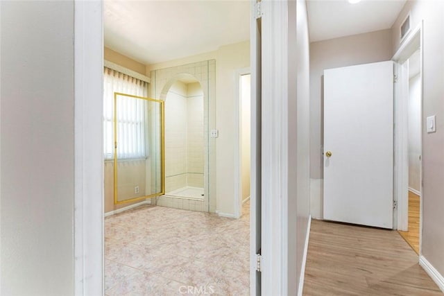 bathroom featuring hardwood / wood-style flooring