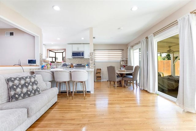 living room with light wood-type flooring