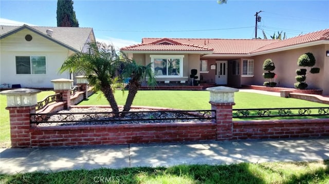 view of front of house with a front lawn