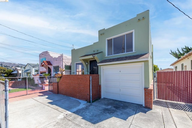 view of front of home with a garage