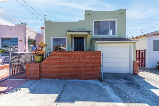 view of front of property featuring a garage