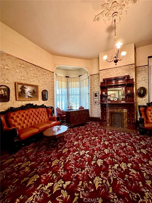 carpeted living room with a notable chandelier