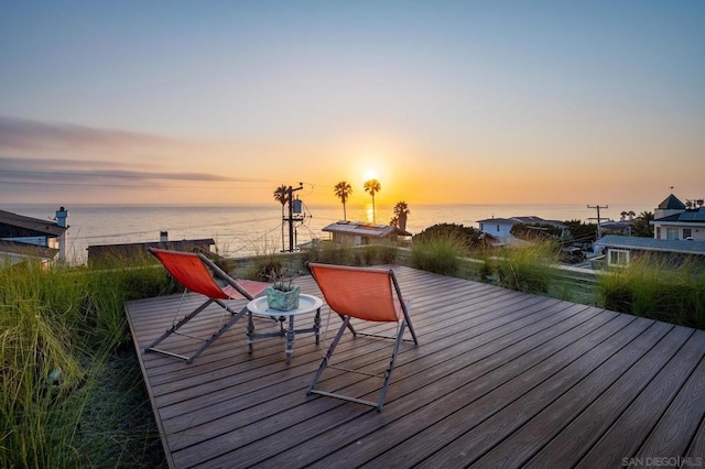 deck at dusk with a water view