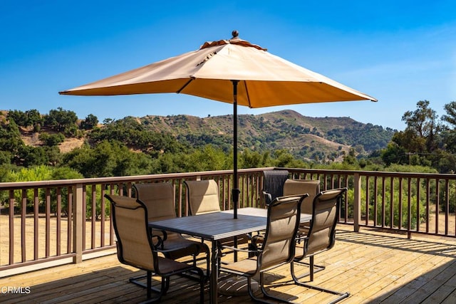 wooden terrace featuring a mountain view