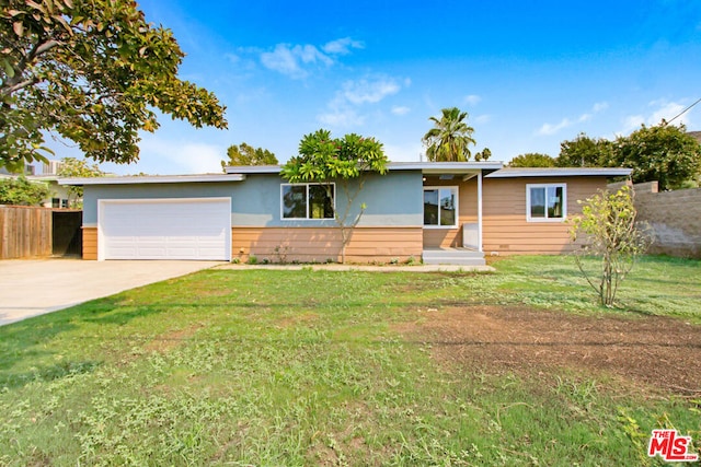 single story home with a front lawn and a garage