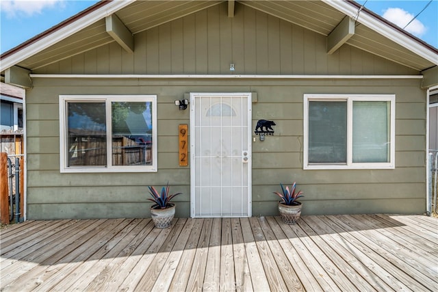 doorway to property featuring a deck