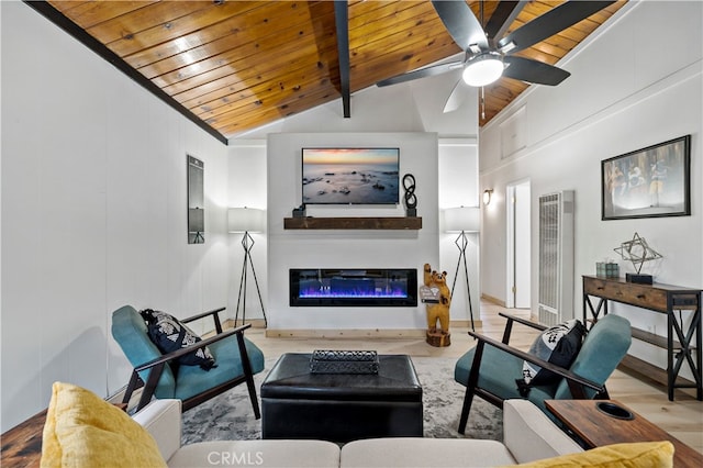 living room featuring ceiling fan, wood ceiling, light hardwood / wood-style flooring, a large fireplace, and vaulted ceiling