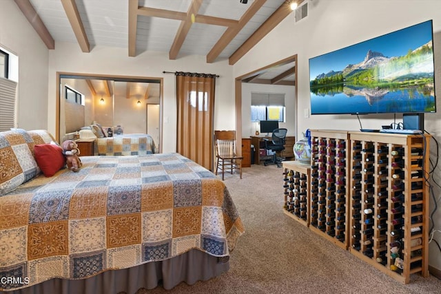 bedroom featuring carpet floors and lofted ceiling with beams