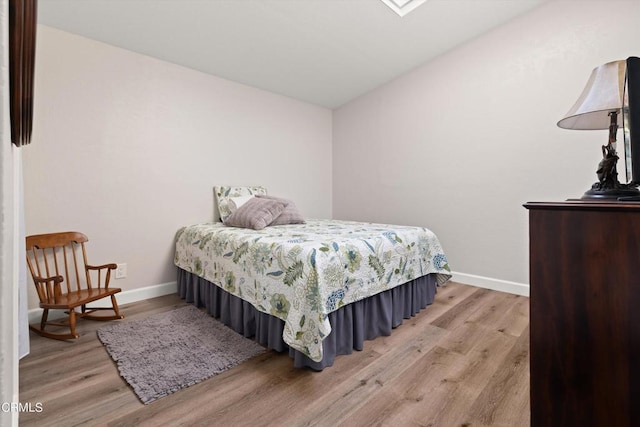 bedroom featuring light hardwood / wood-style floors