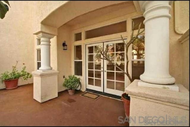 doorway to property with french doors