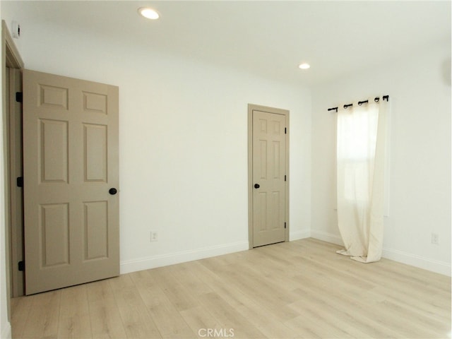 empty room featuring light hardwood / wood-style flooring