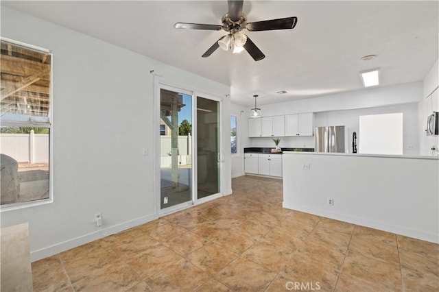 spare room featuring ceiling fan