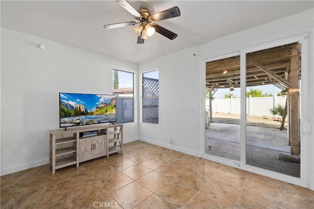 living room featuring ceiling fan