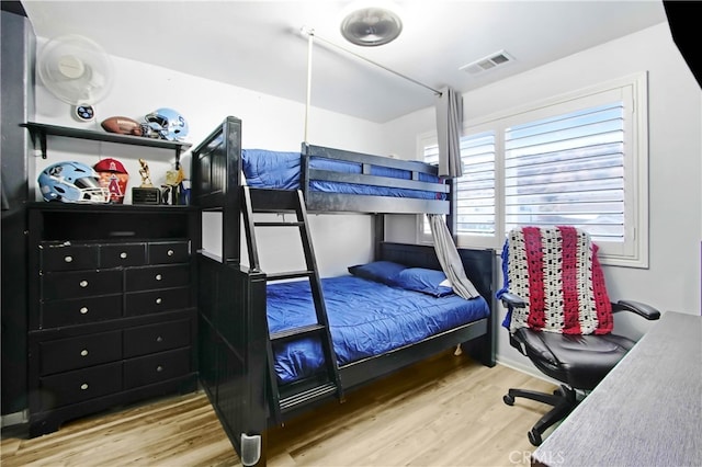 bedroom with light hardwood / wood-style floors