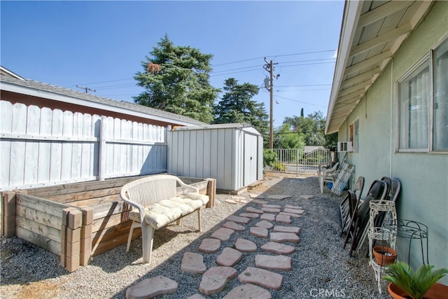 view of patio / terrace featuring a storage shed