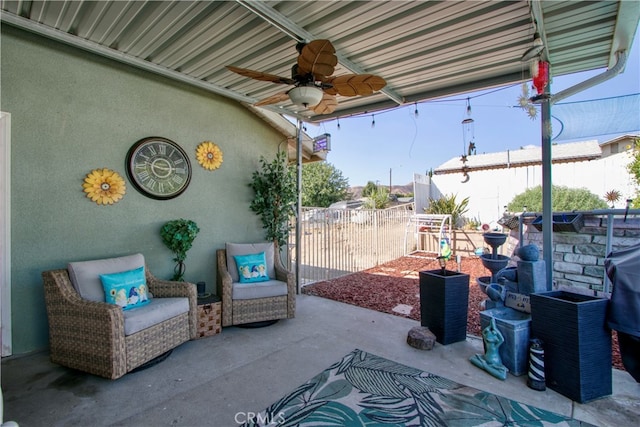 view of patio featuring ceiling fan