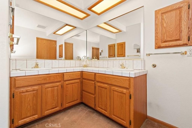 full bathroom with a sink, visible vents, and double vanity