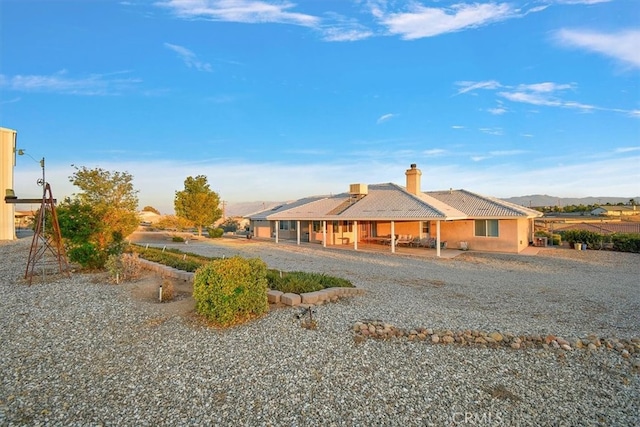 view of front of house with a mountain view